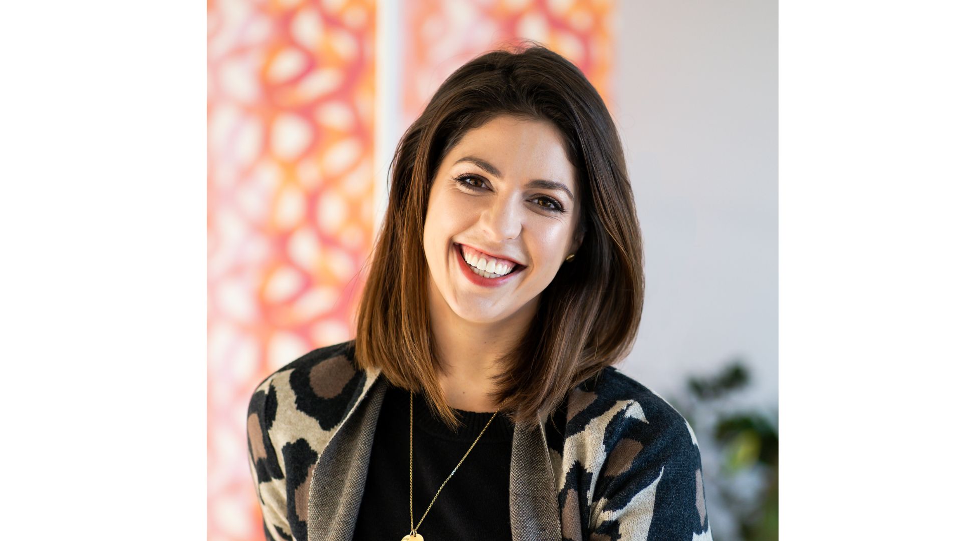 Image of woman smiling at camera