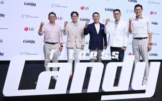 Fitness Candy CEO Shim Woo-taek, SM Entertainment co-CEO Lee Sung-su, LG Electronics CEO Cho Joo-wan, SM Entertainment co-CEO Tak Young-joon and Fitness Candy’s chief strategy officer Kim Bee-oh pose for a photo during the launch ceremony of their joint venture Fitness Candy
