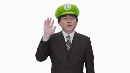 Former Nintendo president Satoru Iwata in a Luigi hat