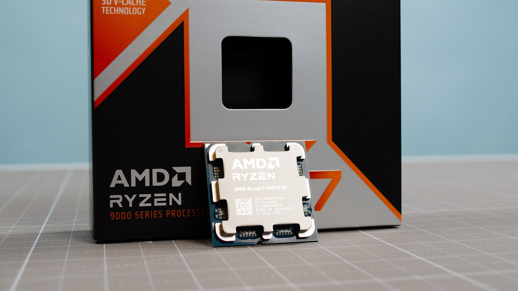An AMD Ryzen 7 9800X3D on a desk