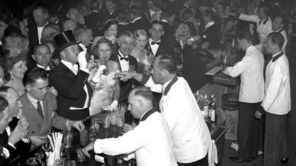 General scene of drinking in cocktail bar during first act intermission at the Metropolitan Opera House