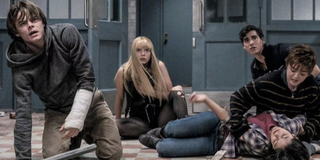 Cannonball, Magik, Sunspot, Wolfsbane and Mirage look terrified as they sit on the ground of the institution in The New Mutants