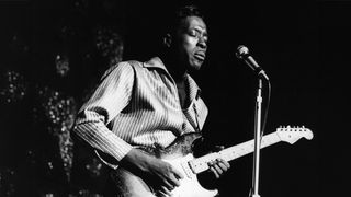 American blues guitarist and singer Buddy Guy performs live playing a Fender Stratocaster guitar on the American Folk Blues Festival tour in London in October 1965. 