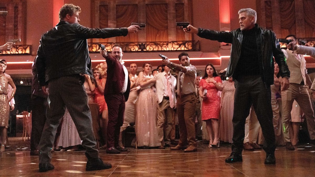 Brad Pitt and George Clooney level guns at one another in a ballroom &quot;Wolfs&quot;