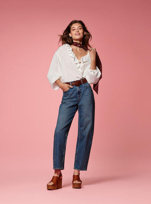 Woman in Old Navy jeans and blouse