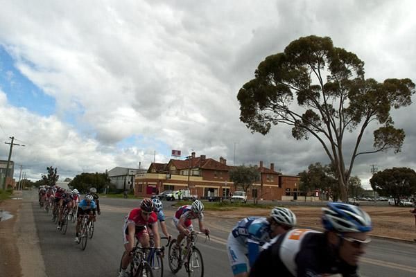 The peloton heads down the back straight during the 33km criterium in Merbein.