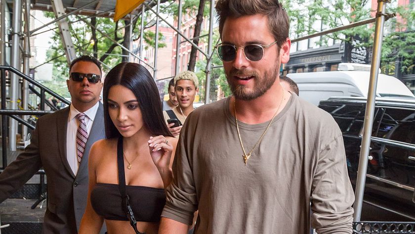 Scott Disick and Kim Kardashian walking together in New York City.