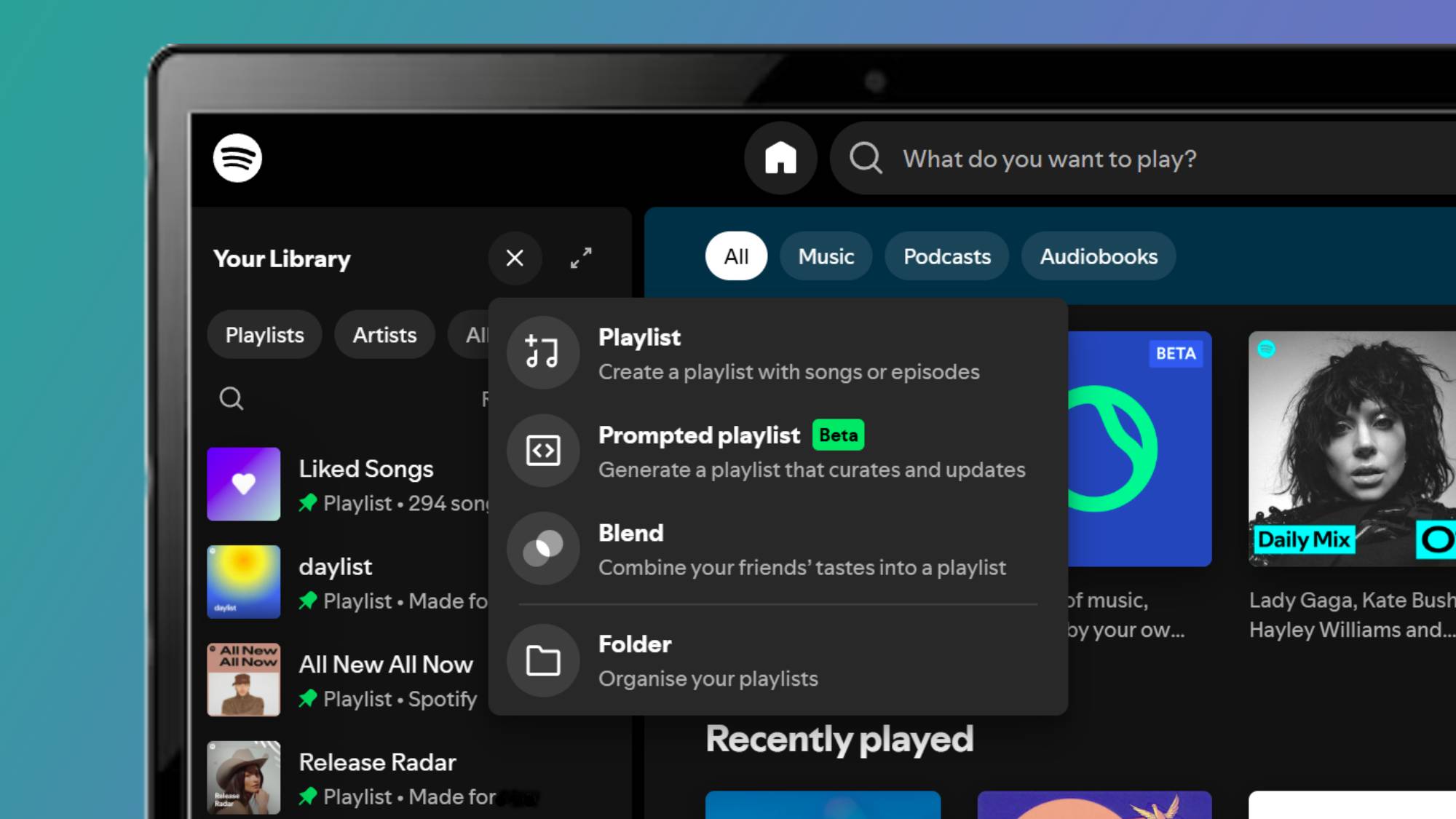 A laptop screen showing Spotify's desktop app