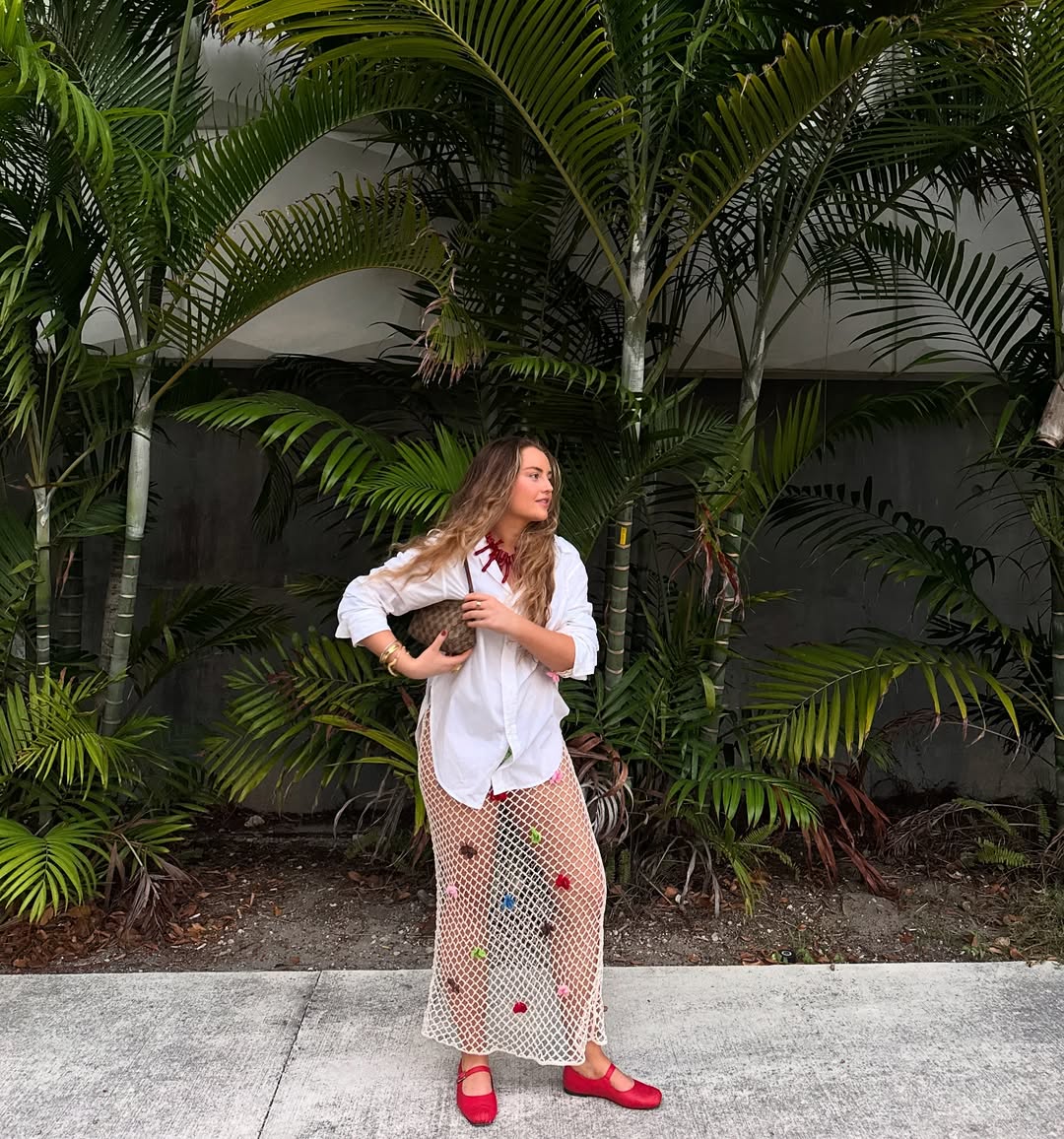 Lauren Cunningham wears fisherman net skirt
