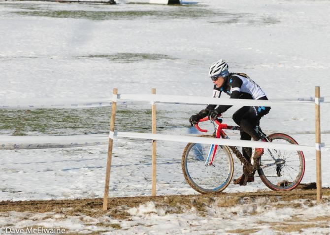 Katie Compton (Trek Cyclocross Collective) riding alone around a frozen pond