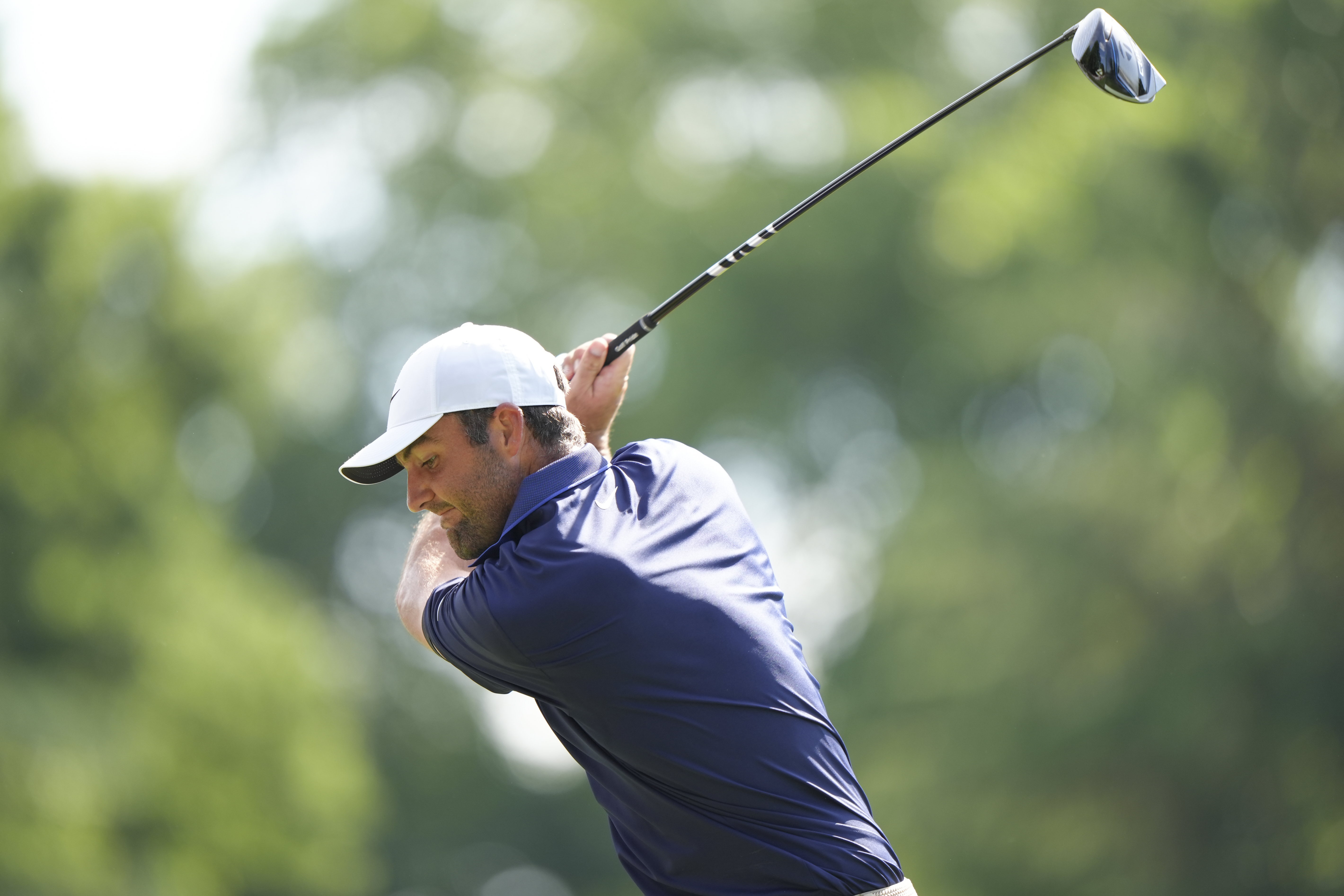 Scottie Scheffler hits a driver off the tee