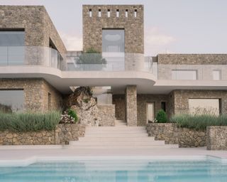 Corfu House minimalist interior and stone exterior with swimming pool looking to the sea