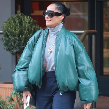 tracee ellis ross wears yellow Bottega Veneta rain boots