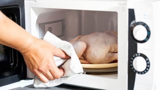 Defrosting a raw chicken in microwave