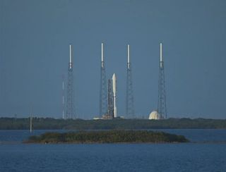 A United Launch Alliance rocket carrying the U.S. Navy's MUOS-1 satellite stands poised for launch in this view from a ULA webcast on Feb. 16, 2012.
