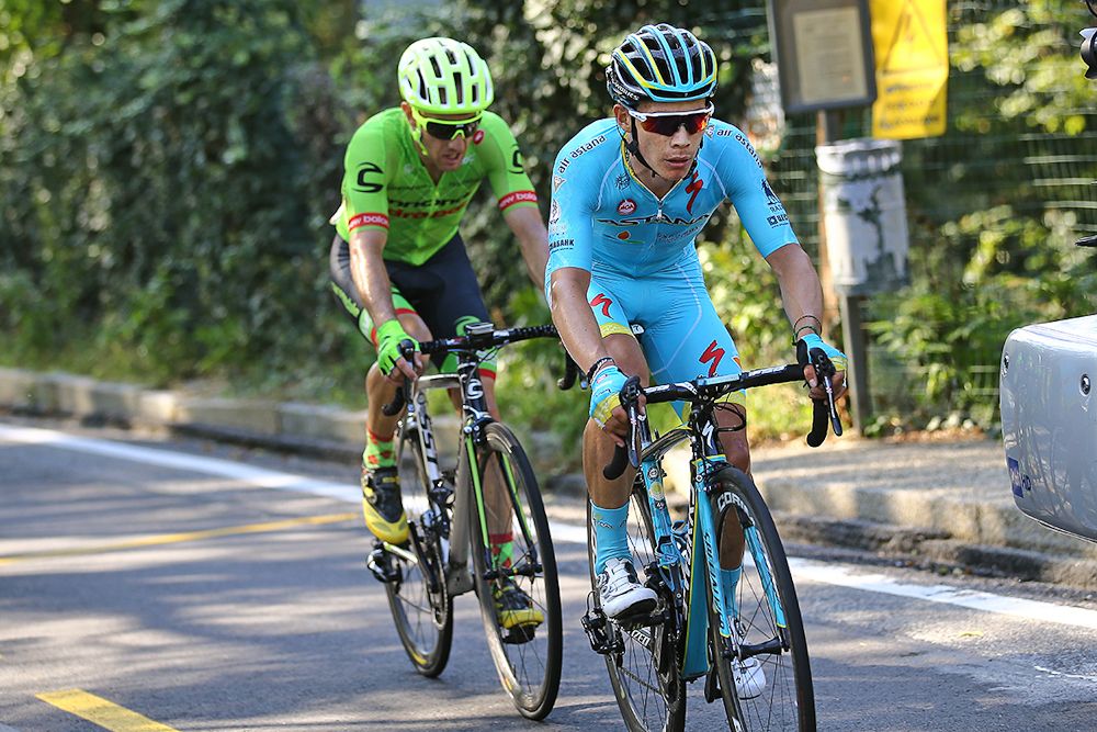 Miguel Angel Lopez an Mike Woods battle near the end of Milano-Torino