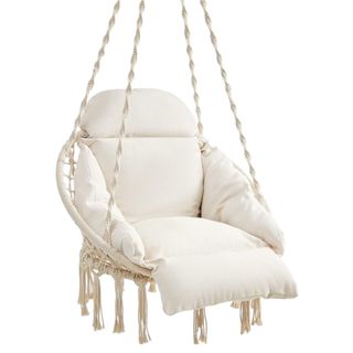 A white hanging chair with cushioned seating