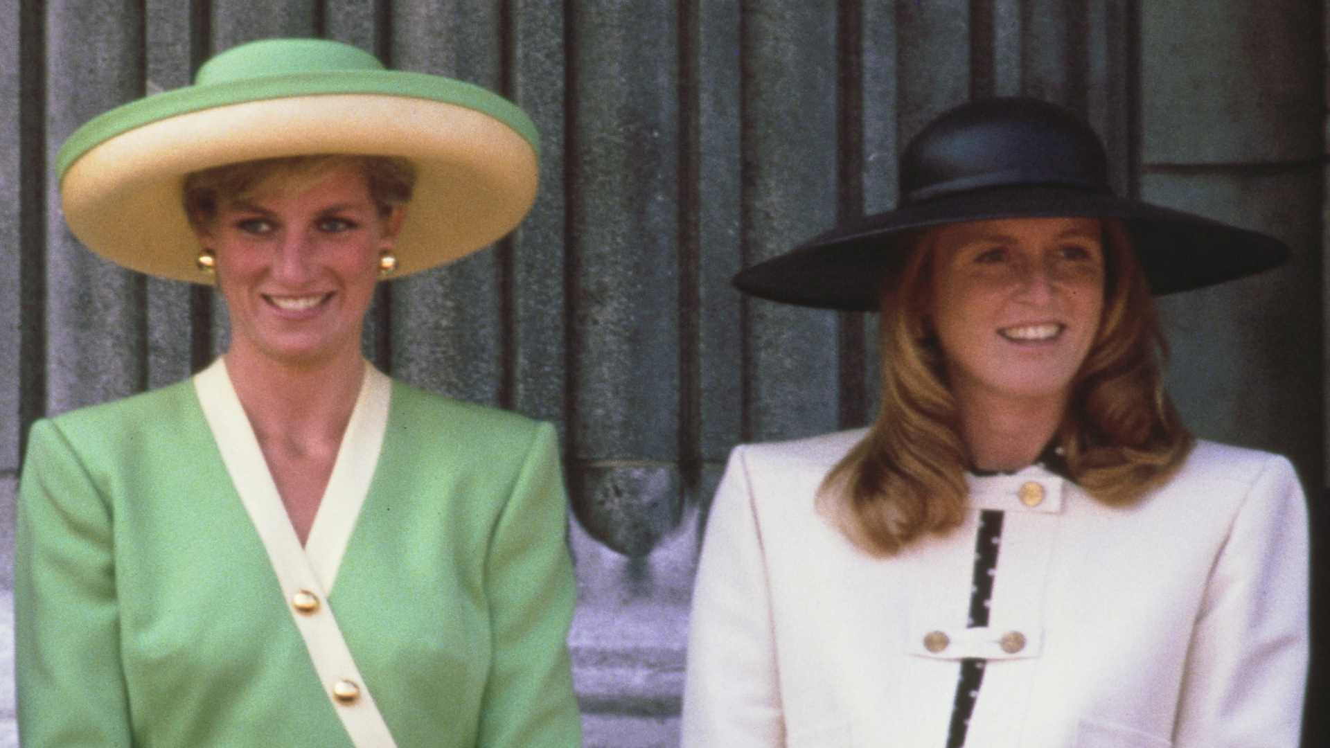 Princess Diana wears a green outfit while Sarah Ferguson wears a black dress with a white jacket and white hat at Trooping the Colour 1990