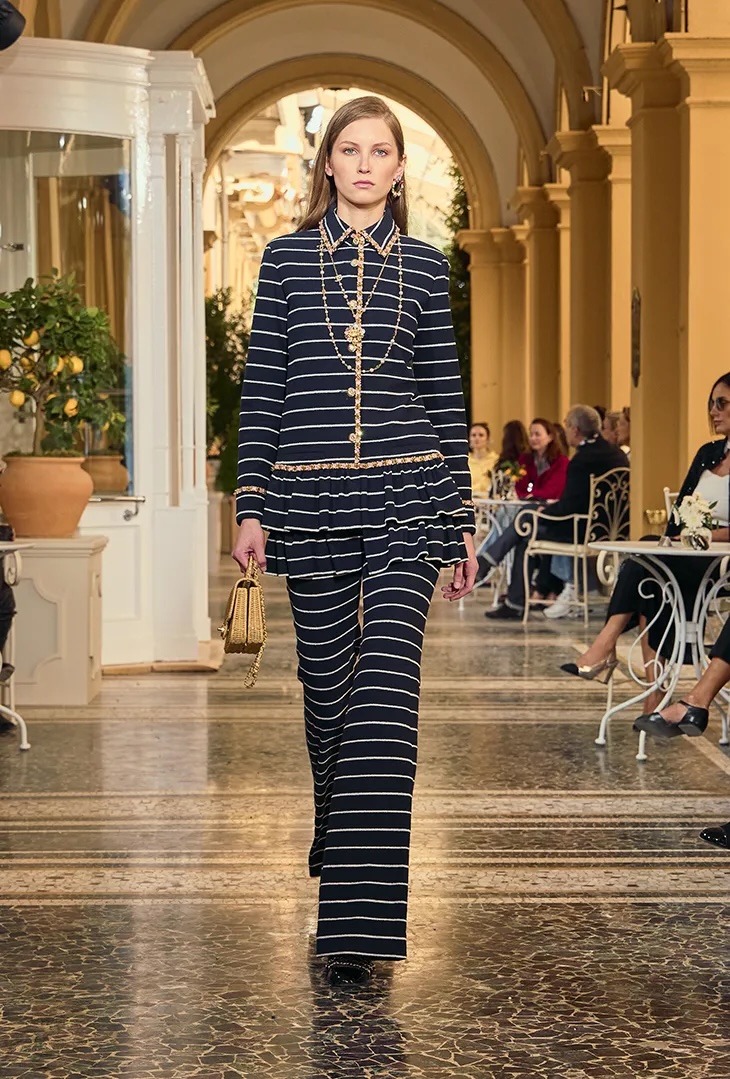 Chanel model in a Breton stripe two piece