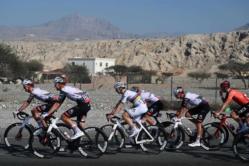 JEBEL JAIS UNITED ARAB EMIRATES FEBRUARY 19 LR Mikkel Norsgaard Bjerg of Denmark Florian Vermeersch of Belgium and Tadej Pogacar of Slovenia and UAE Team Emirates compete during the 7th UAE Tour 2025 Stage 3 a 181km stage from Ras al Khaimah to Jebel Jais 1490m UCIWWT on February 19 2025 in Jebel Jais United Arab Emirates Photo by Dario BelingheriGetty Images
