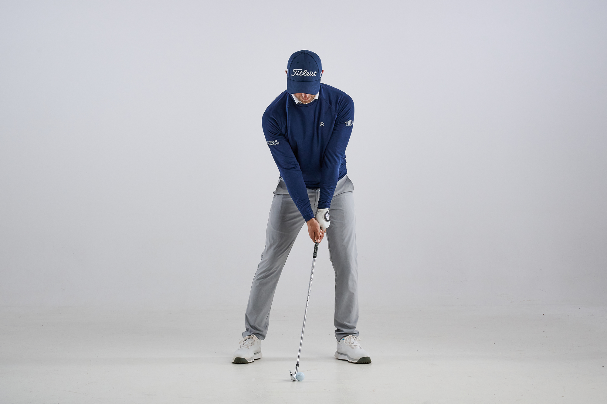 Alex Buckner with pressure forwards at address