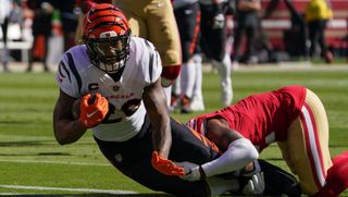 Joe Mixon #28 of the Cincinnati Bengals runs the ball during the first half of an NFL football game against the San Francisco 49ers at Levi's Stadium on October 29, 2023 