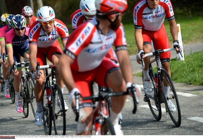 Luca Paolini checks on Alexander Kristoff during the stage