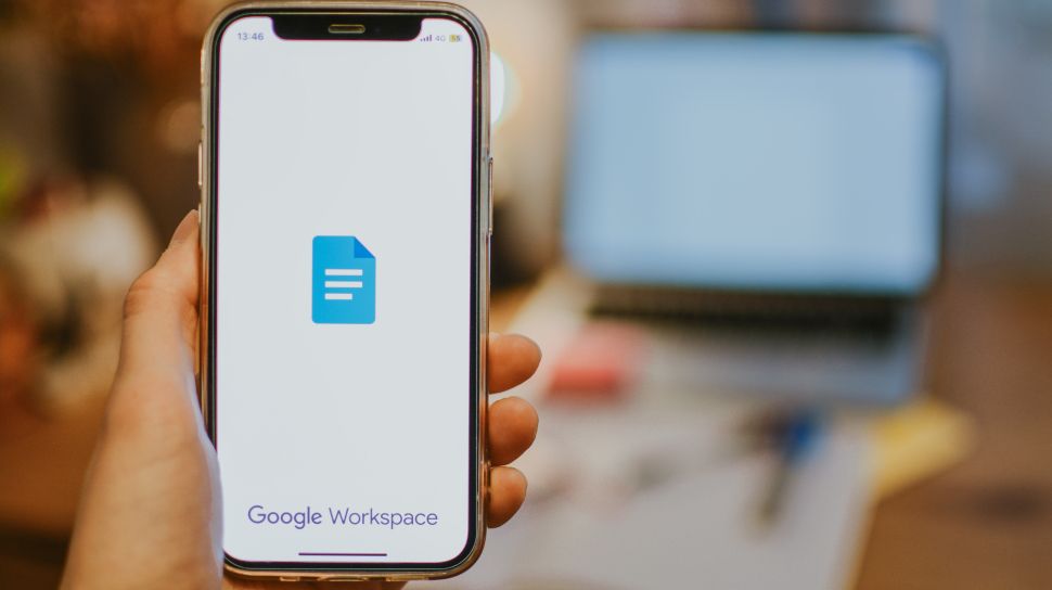 Google Docs on smartphone laptop