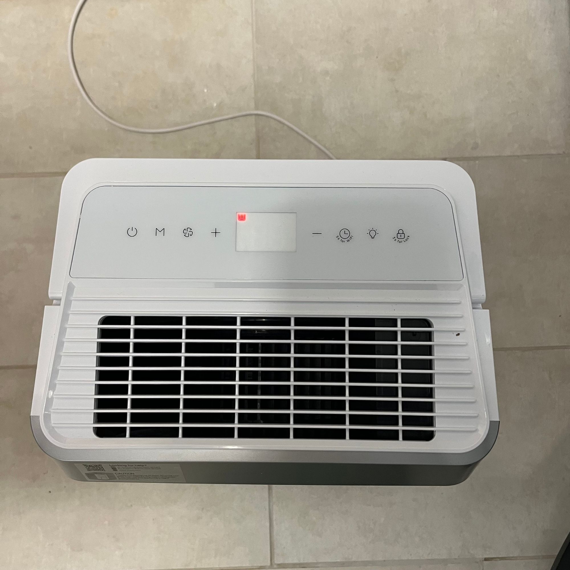 DREO dehumidifier empty water tank symbol on display