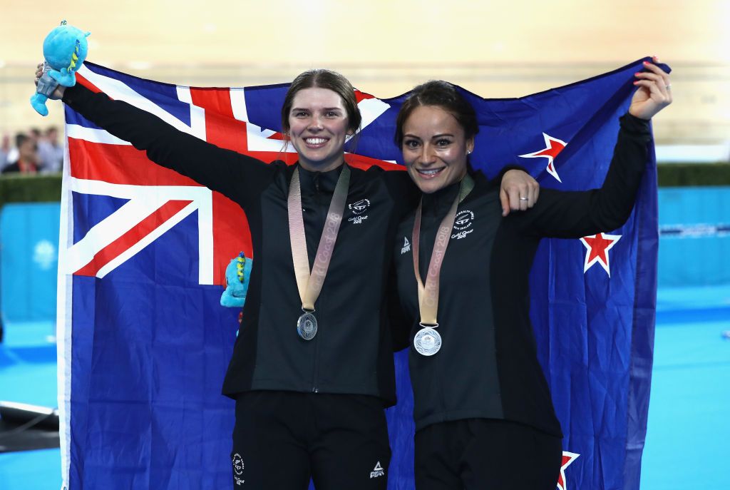 New Zealand's Natasha Hansen and Emma Cumming celebrate a silver in the team sprint