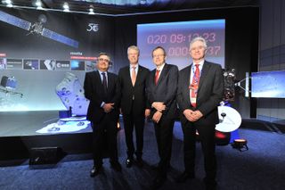 European Space Agency officials pose for a portrait while waiting to wake up the Rosetta comet probe from hibernation on Jan. 20, 2014 at the Space Operations Center in Darmstadt, Germany.