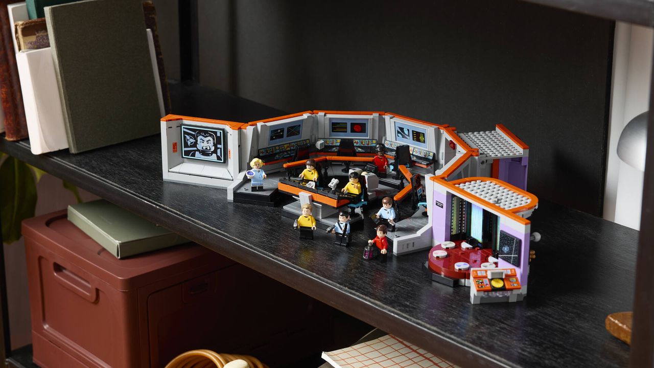 Lego Star Trek Enterprise Bridge set on a dark wooden shelf