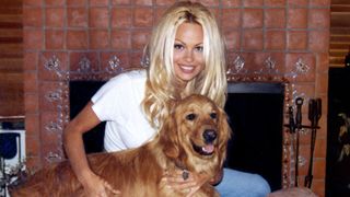 Pamela Anderson with a dog in Pamela, a love story