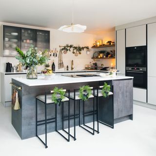 kitchen island in open-plan diner with festive decor