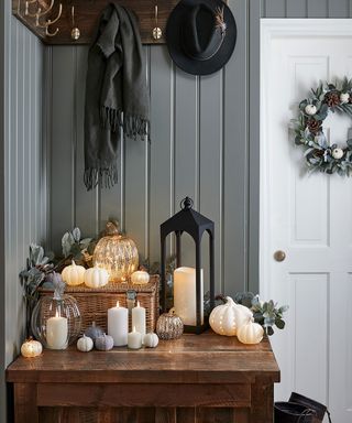gray hallway with pumpkins and halloween decorations