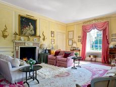 Fig 2: The drawing room with 17th-century-style panelling and a neo-Classical chimney piece with the portait of Rachel, Countess of Dudley. ©Paul Highnam for Country Life