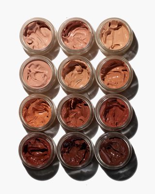 What the Foundation by Jones Road skin tints in open glass jars