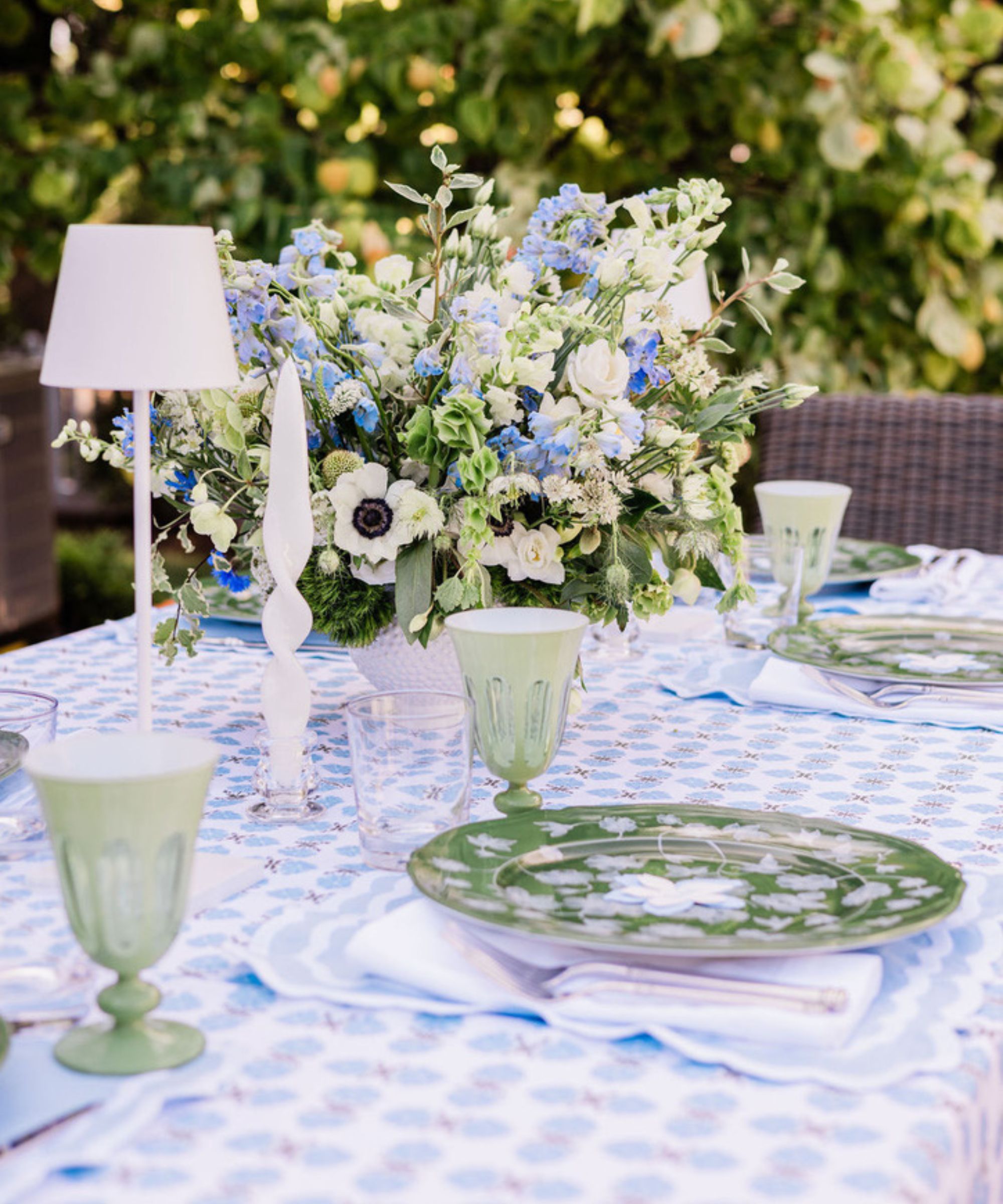 Outdoor table decorated in blue white and green