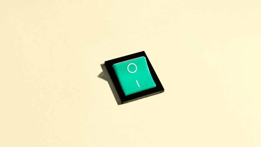 Green switch in the On position on a pastel yellow background