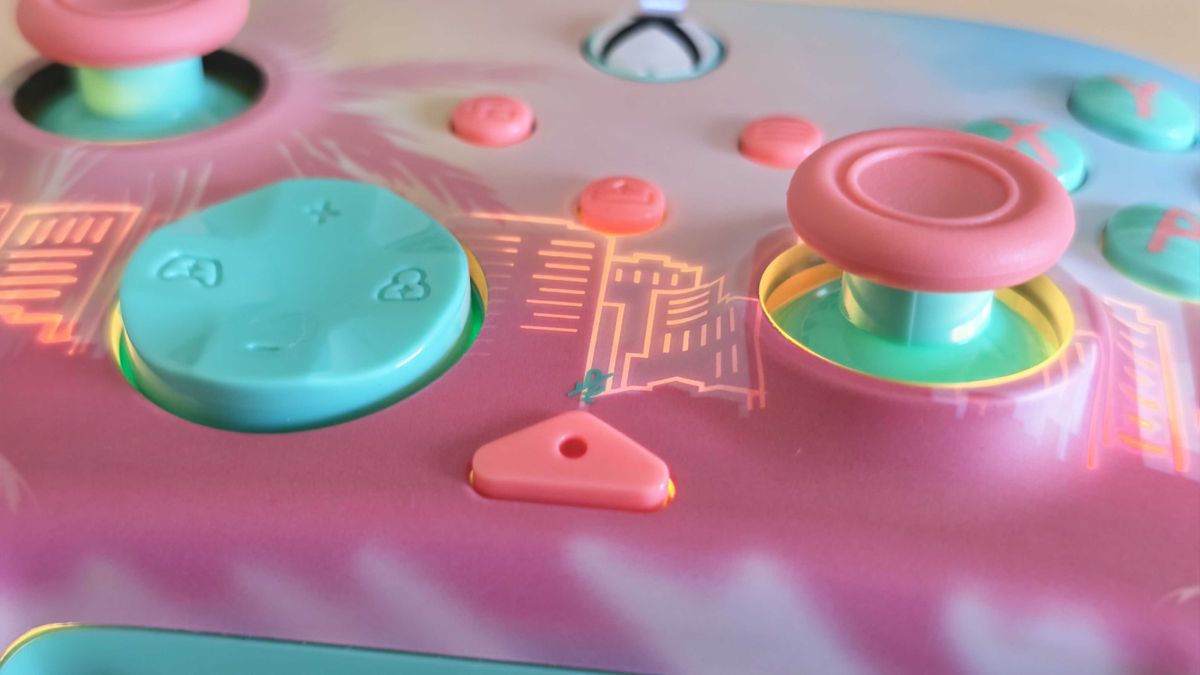The Turtle Beach Pacific Skyline Wireless Controller on a clean wooden surface.