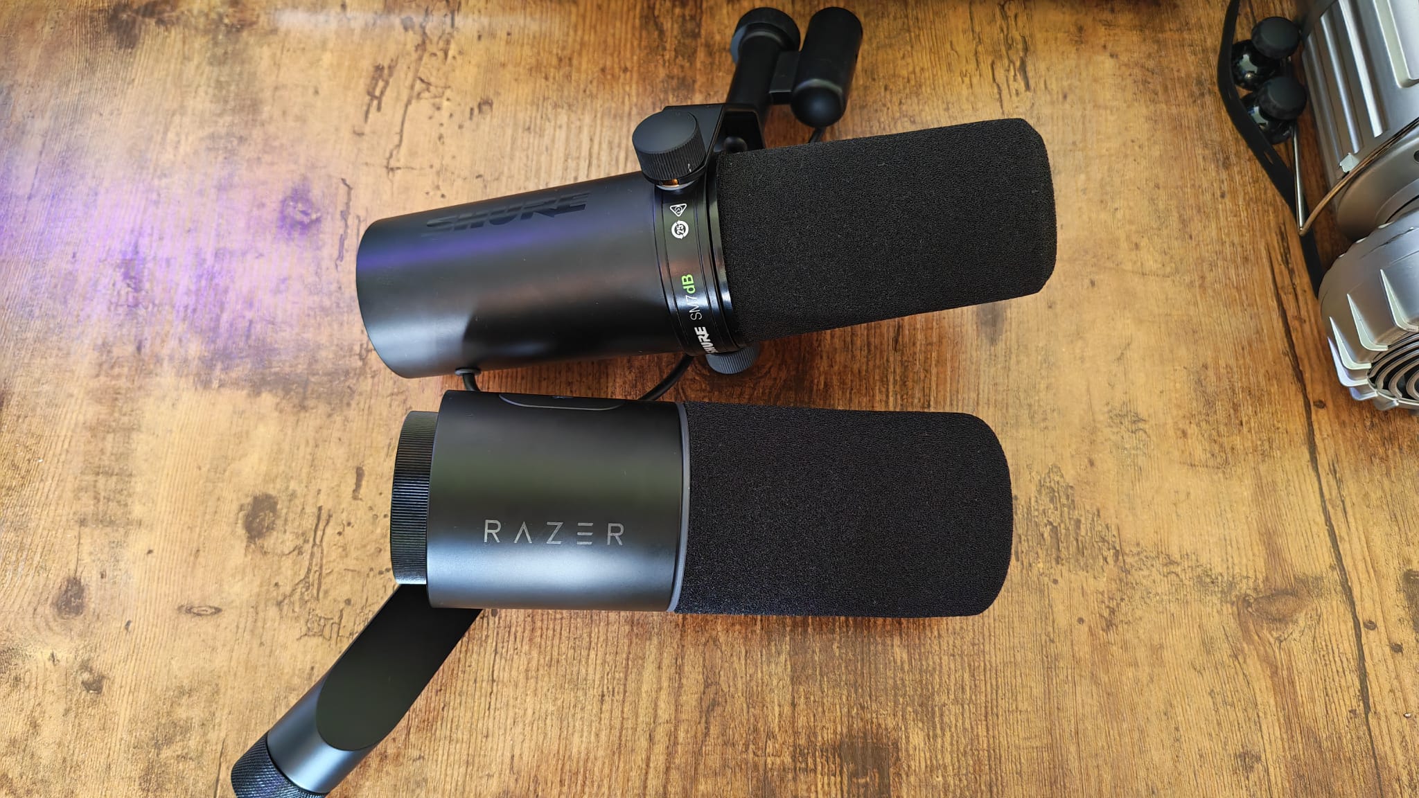The Razer Seiren V3 Pro next to a Shure SM7dB
