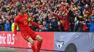 Gareth Bale celebrates Wales' goal against Ukraine.