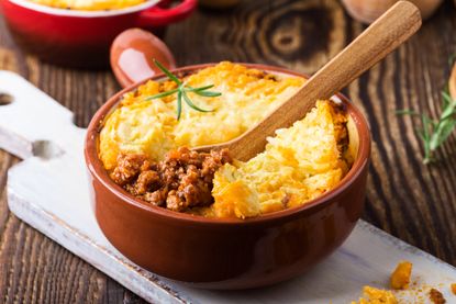 Healthy cottage pie with a spoonful removed