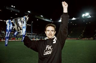 Martin O'Neill celebrates with the League Cup trophy after Leicester City's win over Middlesbrough in a replay in the 1997 final.