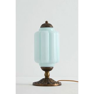 blue milky glass bedside lamp with brass base