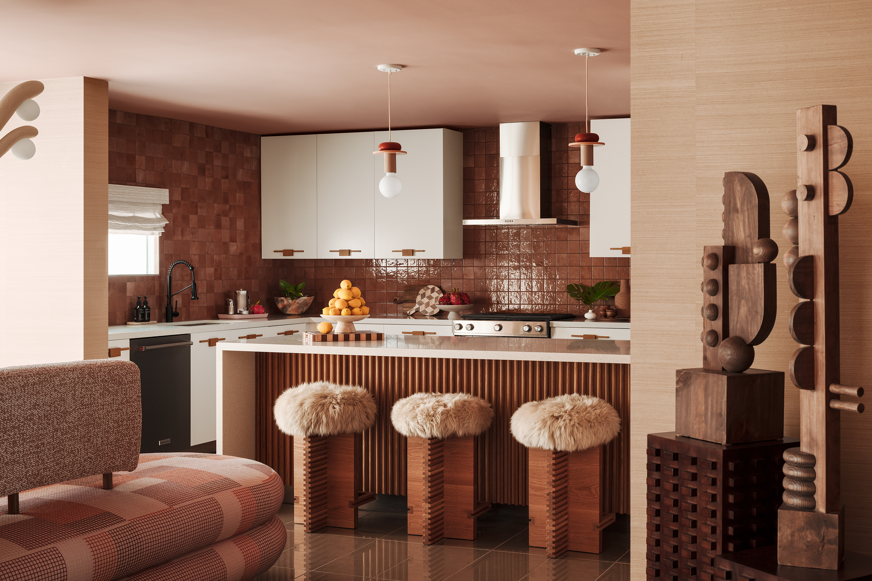 Tiled kitchen with Island and bar stools