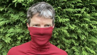 Man with roll-neck over face like a snood