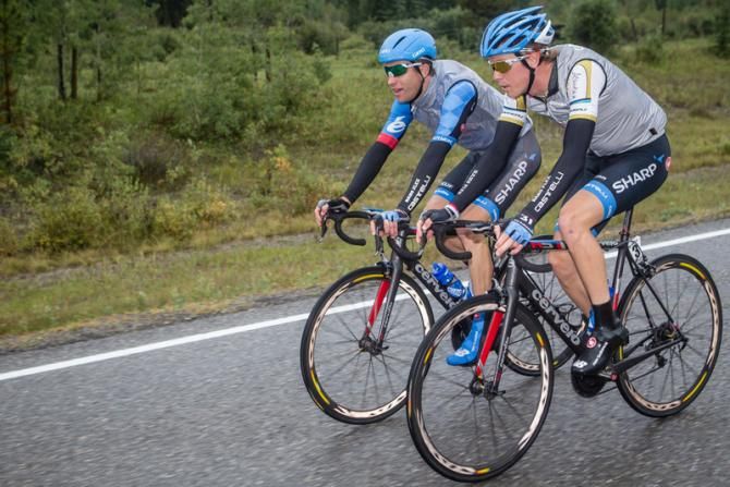 Christian Vande Velde (Garmin-Sharp) and race leader Rohan Dennis have a chat during today's stage.