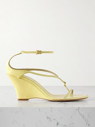 Leather wedge sandals flatter Marion's figure