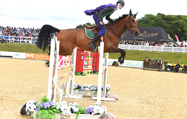 Will Edwards and Ted Holt during the invitational Mini Major Relay during the Equerry Bolesworth International Horse Show at Bolesworth Castle near Chester in Cheshire in the UK on 17th June 2018